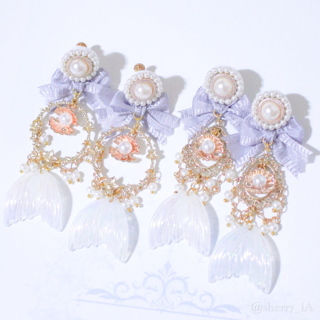 アミュリボン 幻想世界と優美な姫 耳飾り ミロのヴィーナスをイメージした純白の貝殻と人魚姫をコンセプトにしたマーメイドモチーフのハンドメイドアクセサリー ピアス/イヤリング 藤色 2種