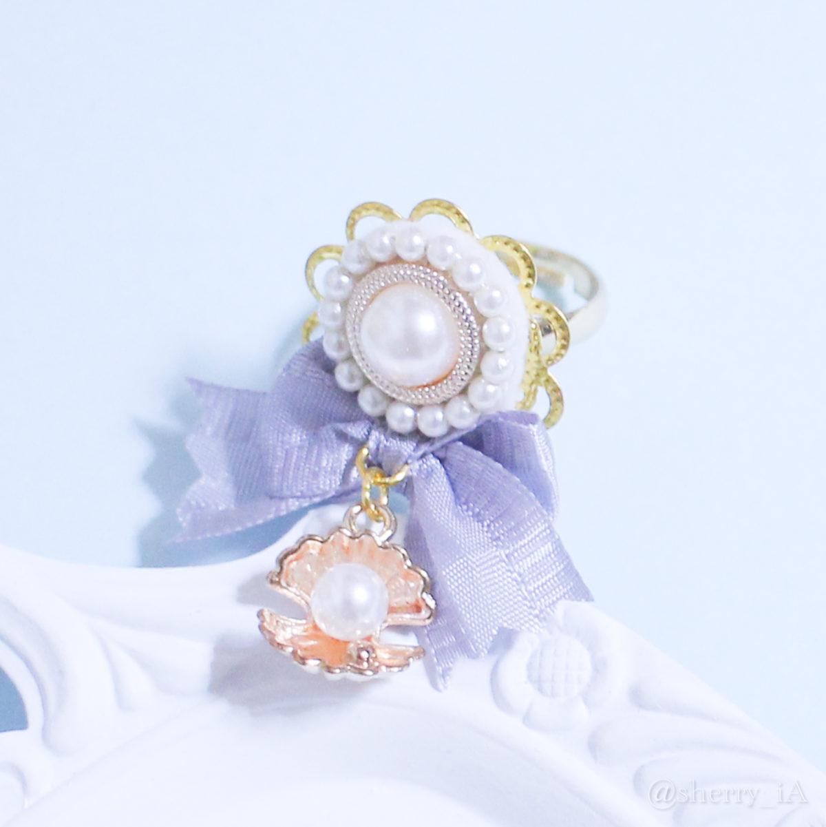 アミュリボン 優美なマーメイドと純白の貝殻リング ミロのヴィーナスをイメージした純白の貝殻をコンセプトにしたマーメイドモチーフのハンドメイドアクセサリー 指輪 藤色